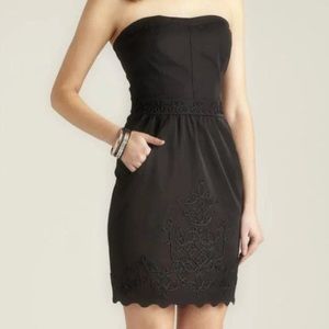 Black strapless embroidered dress with pockets